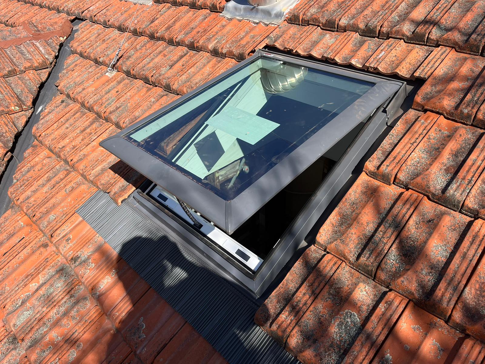 Completed skylight with roof flashing on a tiled roof in Sydney